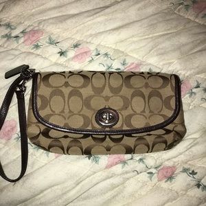Coach khaki turn lock wristlet